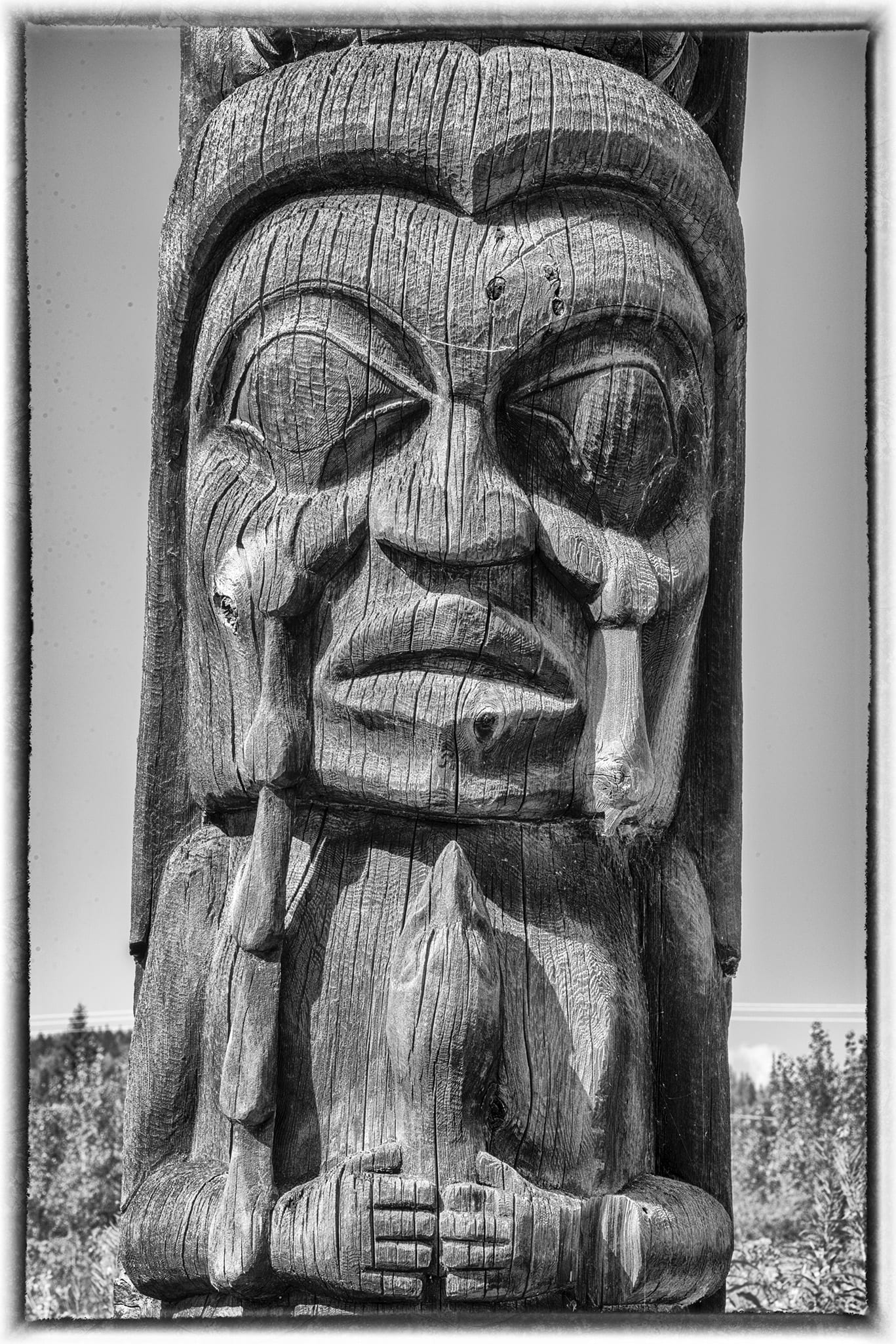Detail of Weeping Woman Totem Pole, Kispiox, British Columbia, Canada.